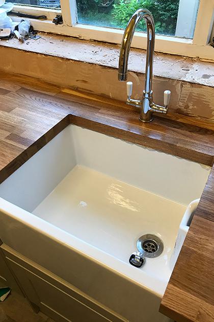 Cottage renovation, kitchen sink installation